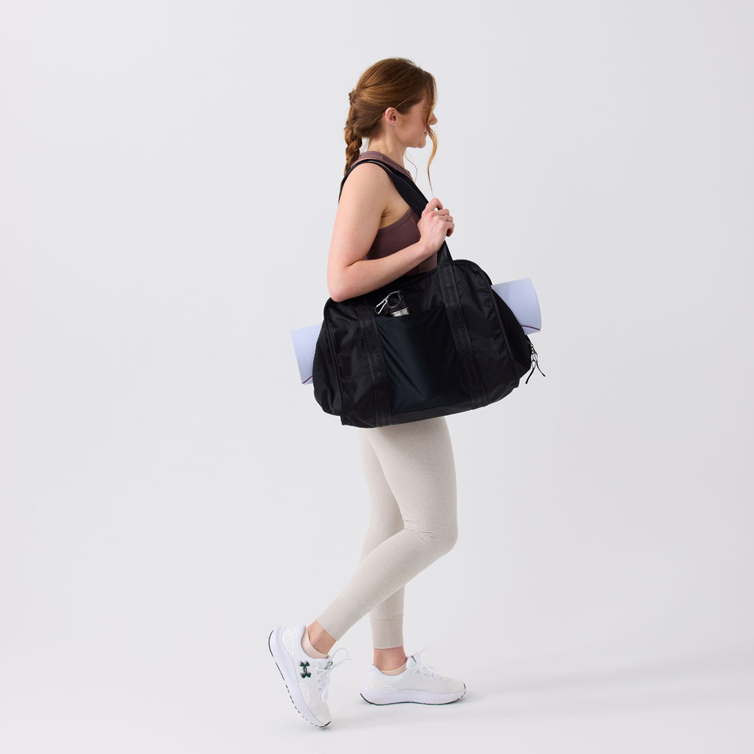 Women's black yoga bag tote with multiple compartments for yoga essentials #black