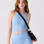 Small shoulder bag for women featuring interior zip pockets and snap slips #black