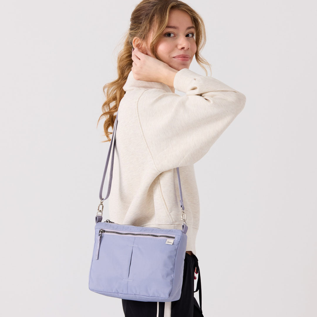 travel‑ready crossbody bag with 3.6 L capacity #lilac