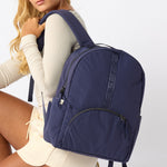 Indigo travel backpack back view with padded straps. #indigo