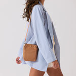 Small nylon shoulder bag with zip compartments for organized storage #camel