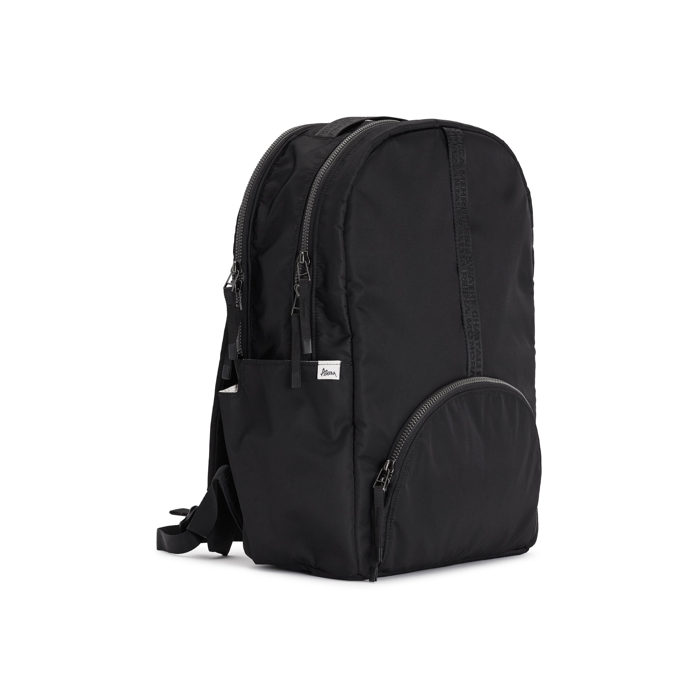 Black Geeta nylon backpack, side profile showing the slim depth, side pocket and padded shoulder straps. #black