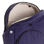 Indigo Geeta nylon backpack open at the top, revealing the gray and white printed-name lining inside the main compartment. #indigo