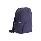 Indigo Geeta nylon backpack, side profile showing the slim depth, side pocket and padded shoulder straps. #indigo