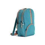 Teal and Camel Geeta nylon backpack, side profile showing the slim depth, side pocket and camel shoulder straps. #teal_and_camel