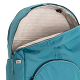 Solid Teal Geeta nylon backpack open at the top, revealing the gray and white printed-name lining inside the main compartment. #solid_teal