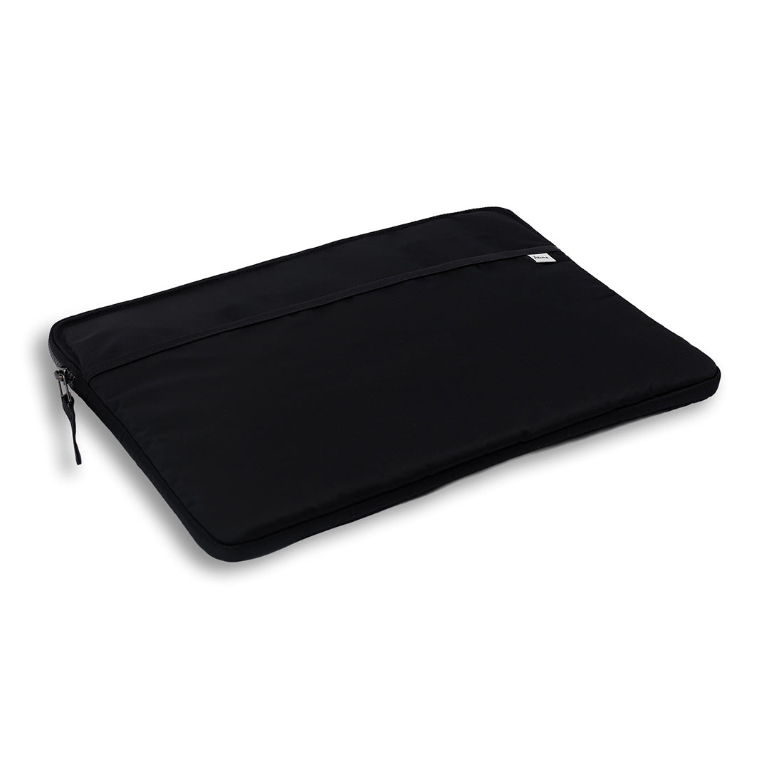 laptop sleeve nylon padded black flat on table #black