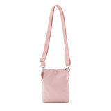 Pink crossbody bag on a white background #blush