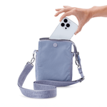 Travel crossbody bag featuring artisan strap printed with names of survivors #lilac