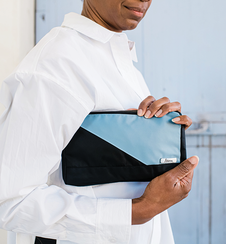 sephura blue - woman in image holding bag