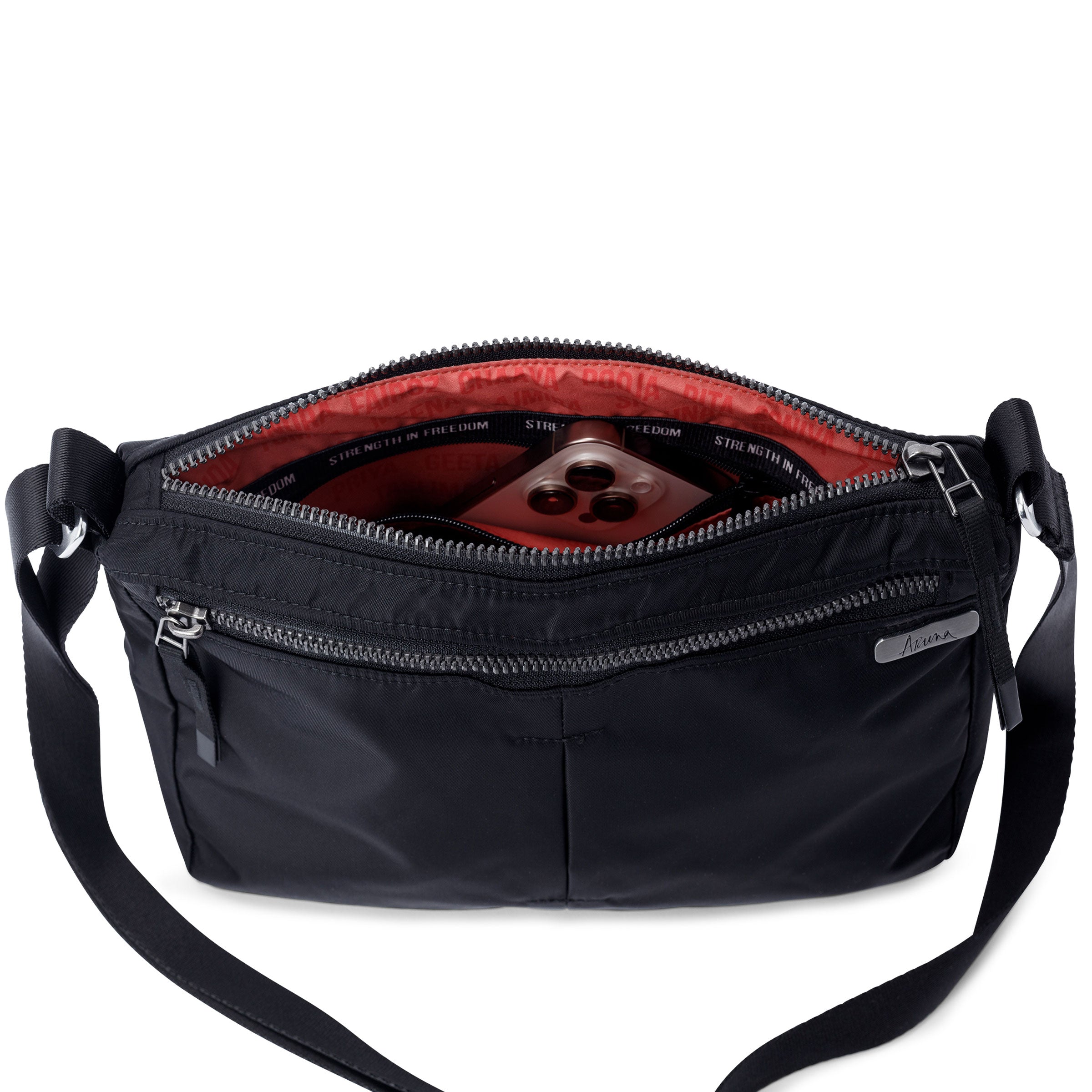 Shree Crossbody in black — interior view with two zip pockets #black