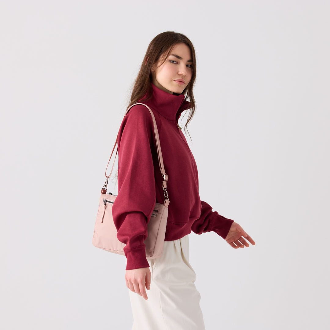 adjustable strap hands‑free travel bag #blush